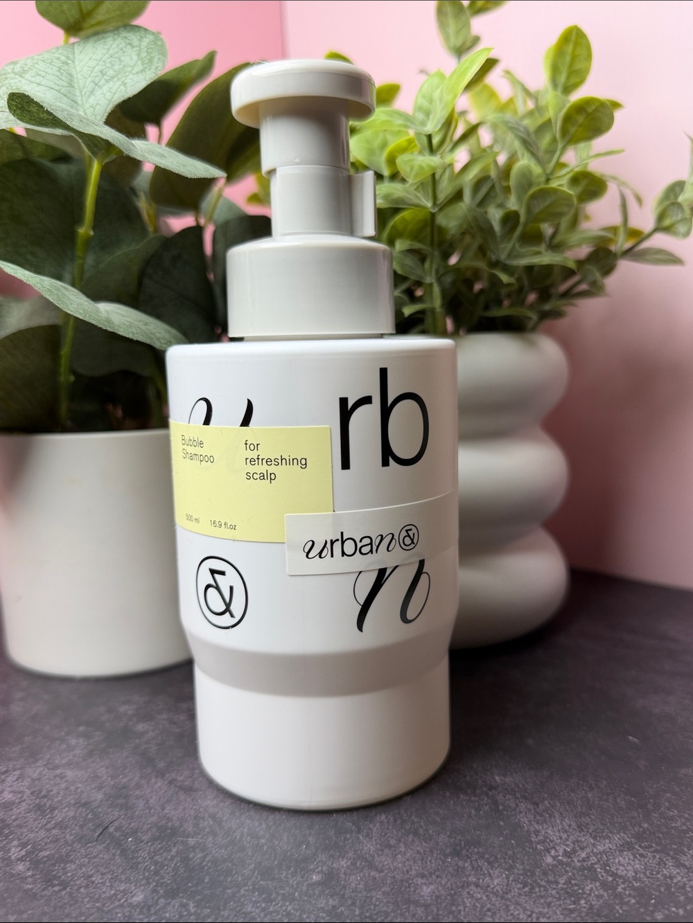 Urban Outfitters White Bottle with Pale Yellow Label Hair Bubble Shampoo